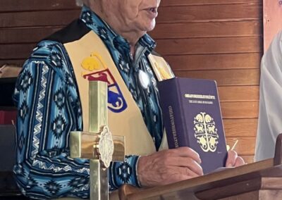 Harvey Satewas Gabriel holding a copy of the Mohawk Bible during a dedication ceremony at Kanesatake United Church in Oka, Quebec on September 9, 2023 (Photo by Martha Pedoniquotte)